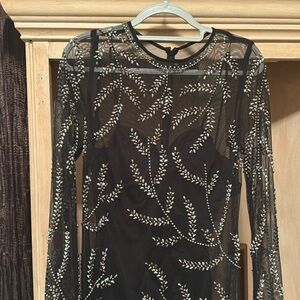 One of a kind absolutely gorgeous on worn once size 12. You will turn heads